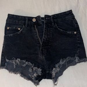 High waisted distressed black shorts